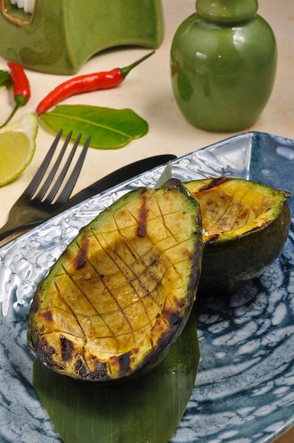 Tasty and delicious grilled avocadoClose up Healthy diet Vegetarian food