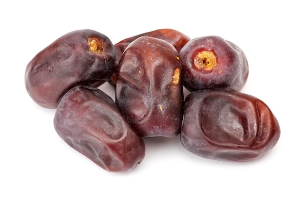 Tasty dry dates isolated on white background