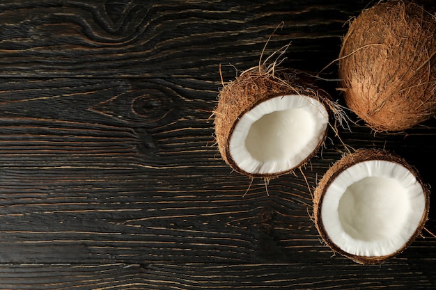 Tasty fresh coconut on wooden background