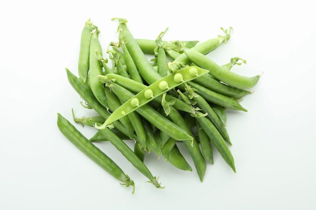 Tasty fresh green pea on white