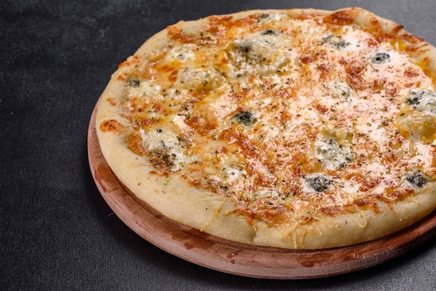 Tasty fresh oven pizza with tomatoes, cheese and mushrooms. Italian cuisine