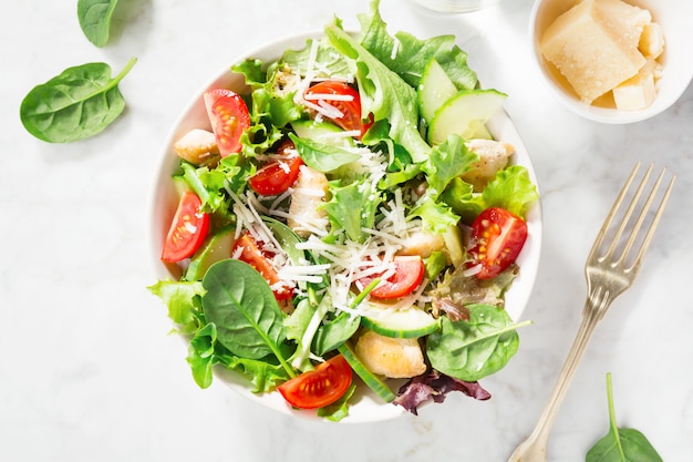 Tasty fresh salad with chicken and vegetables