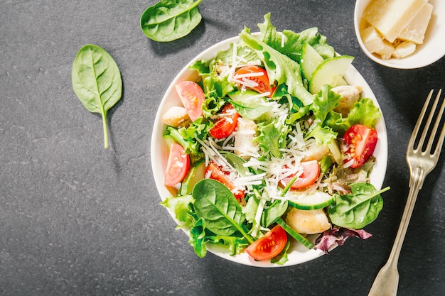 Tasty fresh salad with chicken and vegetables