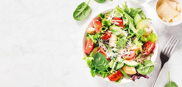 Tasty fresh salad with chicken and vegetables