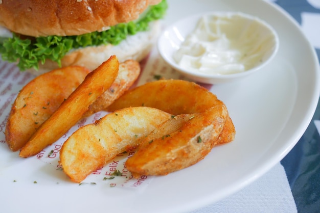 Tasty freshly made wage potato chips in a plate