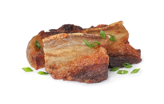 Tasty fried cracklings with parsley on white background Cooked pork lard