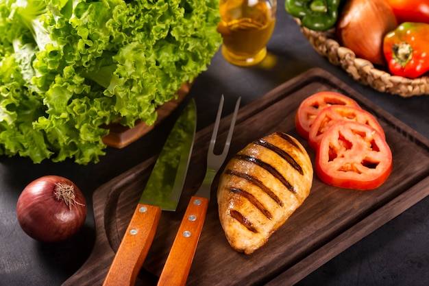 Tasty grilled chicken with salad