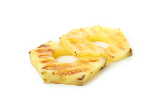 Tasty grilled pineapple isolated on white background.