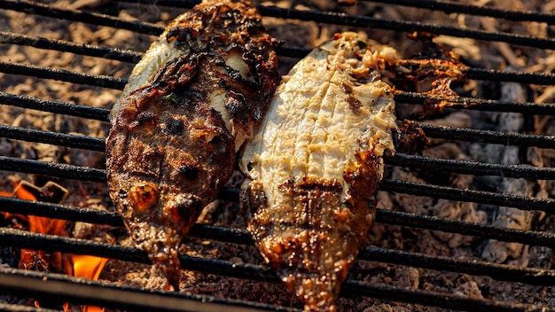 Tasty Grilled sole food detail with smoke