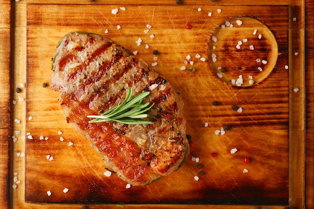 Tasty grilled steak with rosemary