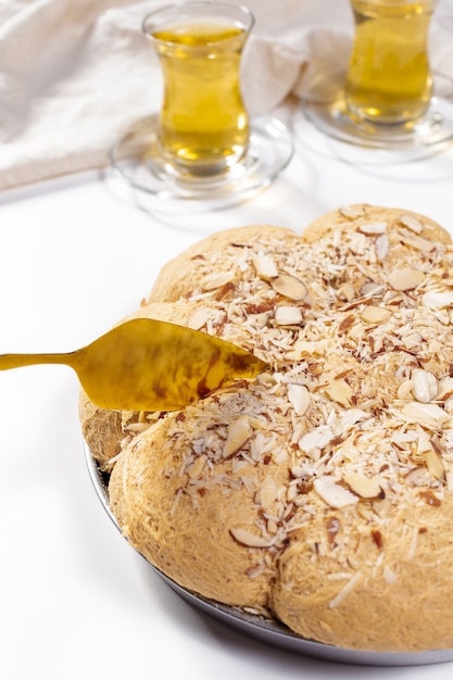 Tasty halva with tea on the table