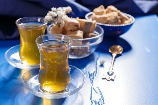 Tasty halva with tea on the table