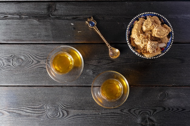 Tasty halva with tea on the table