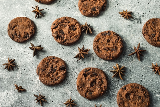 tasty healthy cookies and cinnamon and anise on the table