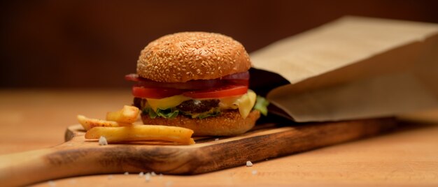 Tasty homemade bacon burger with french fries