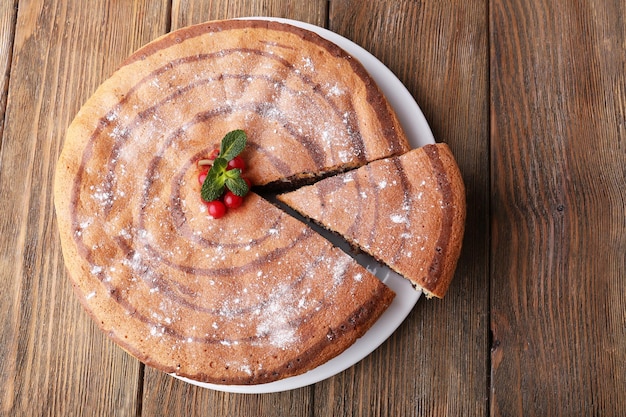 Tasty homemade pie on table