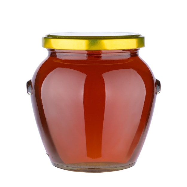 Tasty honey pot preserved glass jar full of honey isolated on white background