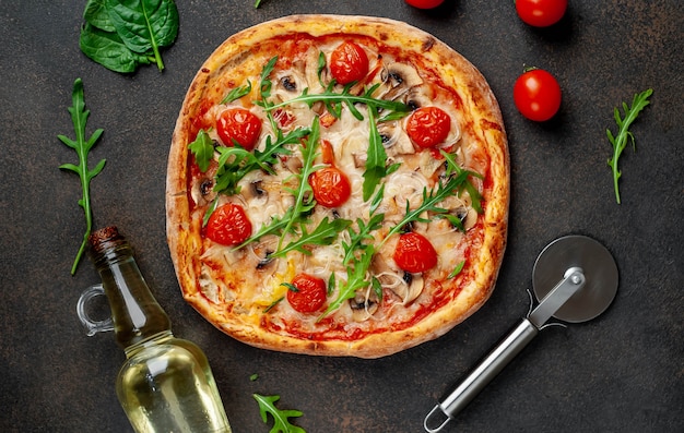 tasty italian pizza with mozzarella cheese, mushrooms, tomato, bell pepper, onion