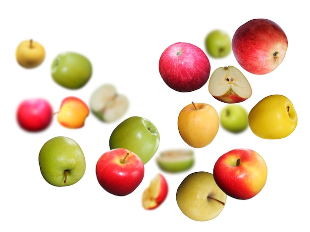 Tasty juicy apples levitate on a white background healthy diet Fresh fruits and vegetables