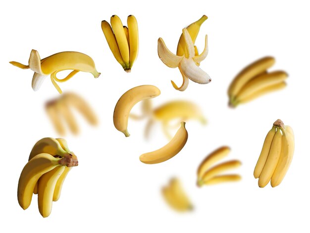 Tasty juicy bananas levitate on a white background healthy diet Fresh fruits and vegetables