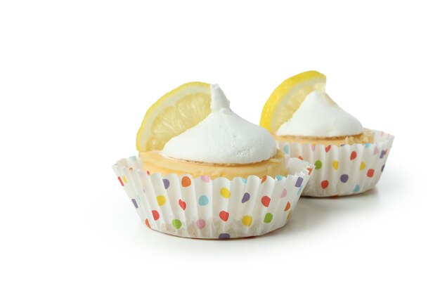 Tasty lemon cupcakes isolated on white background