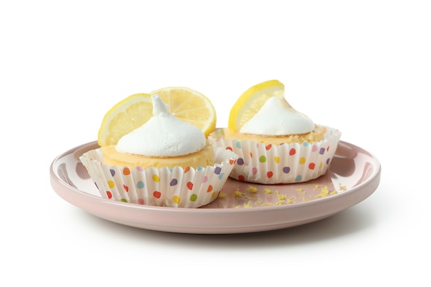 Tasty lemon cupcakes isolated on white background