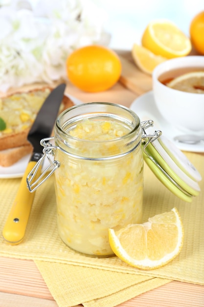 tasty lemon jam on table closeup