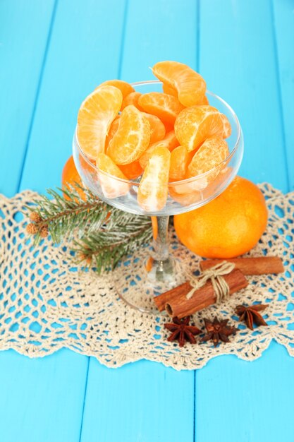 Tasty mandarine's slices in glass bowl