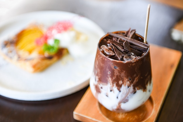 Tasty milkshake with ice cocoa in glass