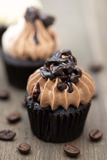 Tasty mini cupcakes on a vintage background, sweet dessert for christmas,