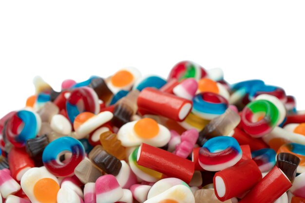 Tasty mix of jelly colorful candies isolated on a white background