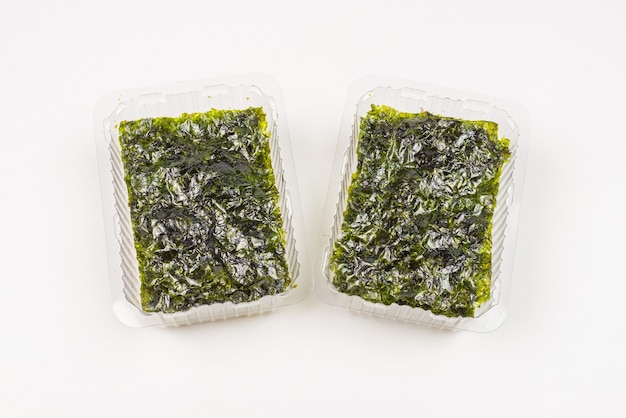 Tasty nori seaweed isolated on white.