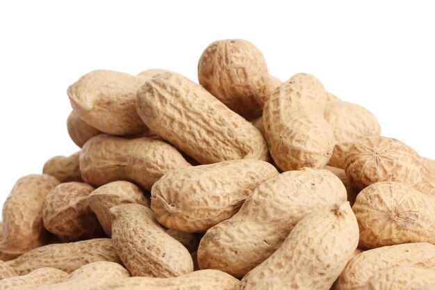 Tasty peanuts isolated on white