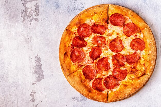 Tasty pepperoni pizza on the table
