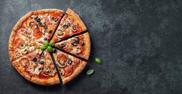 Tasty pepperoni pizza with mushrooms and olives.