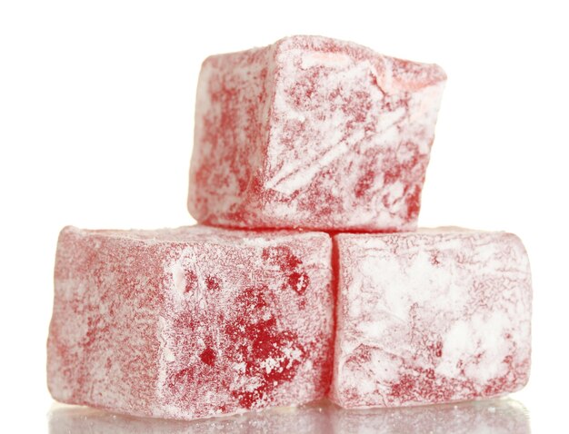 Tasty pieces of turkish delight isolated on white