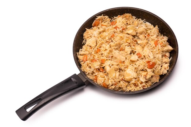 Tasty pilaf with chicken in a frying pan