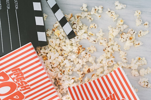 Tasty popcorn and clapboard 