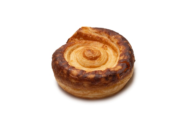 Tasty puff isolated on a white surface. Top view.