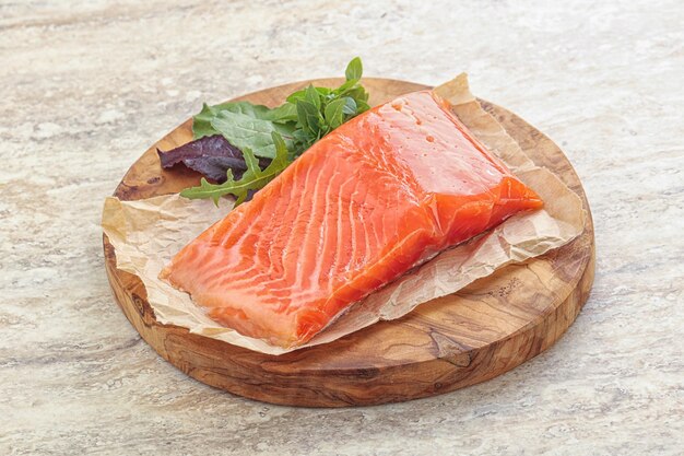 Tasty Raw salmon fillet over board