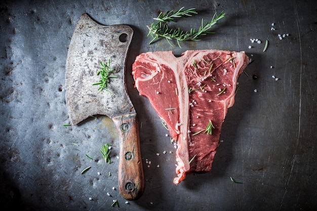 Tasty red steak with salt and rosemary