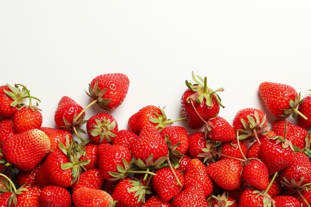 Tasty red strawberry on white background, space for text. Summer berry