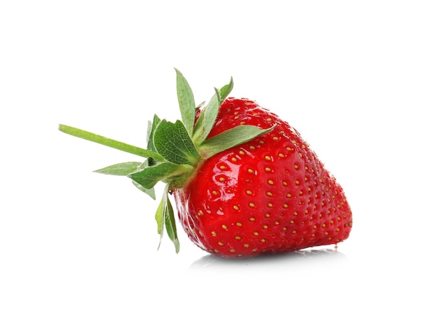 Tasty red strawberry on white surface, closeup