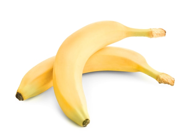 Tasty ripe bananas on white background