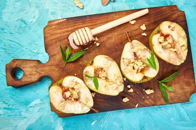 Tasty roast pears with honey and walnuts