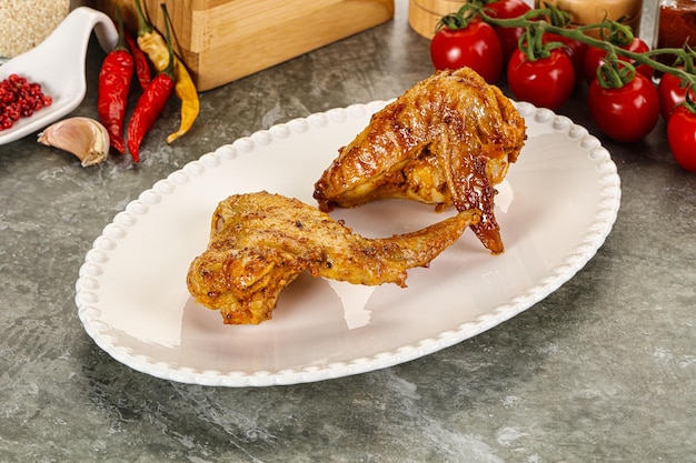 Tasty roasted chicken wing with spices
