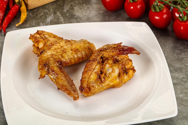 Tasty roasted chicken wing with spices