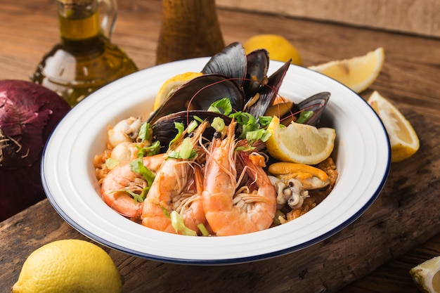 Tasty Spanish paella with seafood .