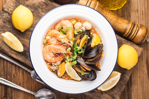 Tasty Spanish paella with seafood .