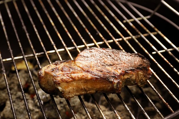 Tasty steak on barbecue grill